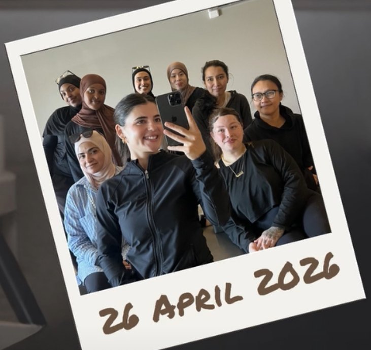 Lara takes a smiling mirror selfie with the women from Pilates × Preston Mosque, shown as a polaroid labelled 26 April 2026.
